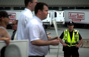 MB_picketers-and-cop