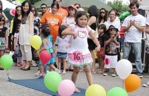 This year's Fiesta features a children's fashion show.