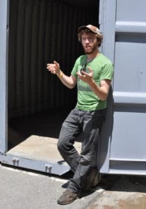 PLAN director Alex Freid at the Artist Dumpster Dive in Durham, NH.