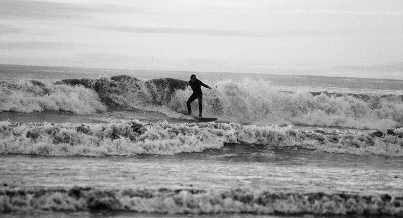 jenness beach winter surfer